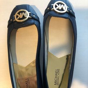 Michael Kors flats. Never worn. Size 11.